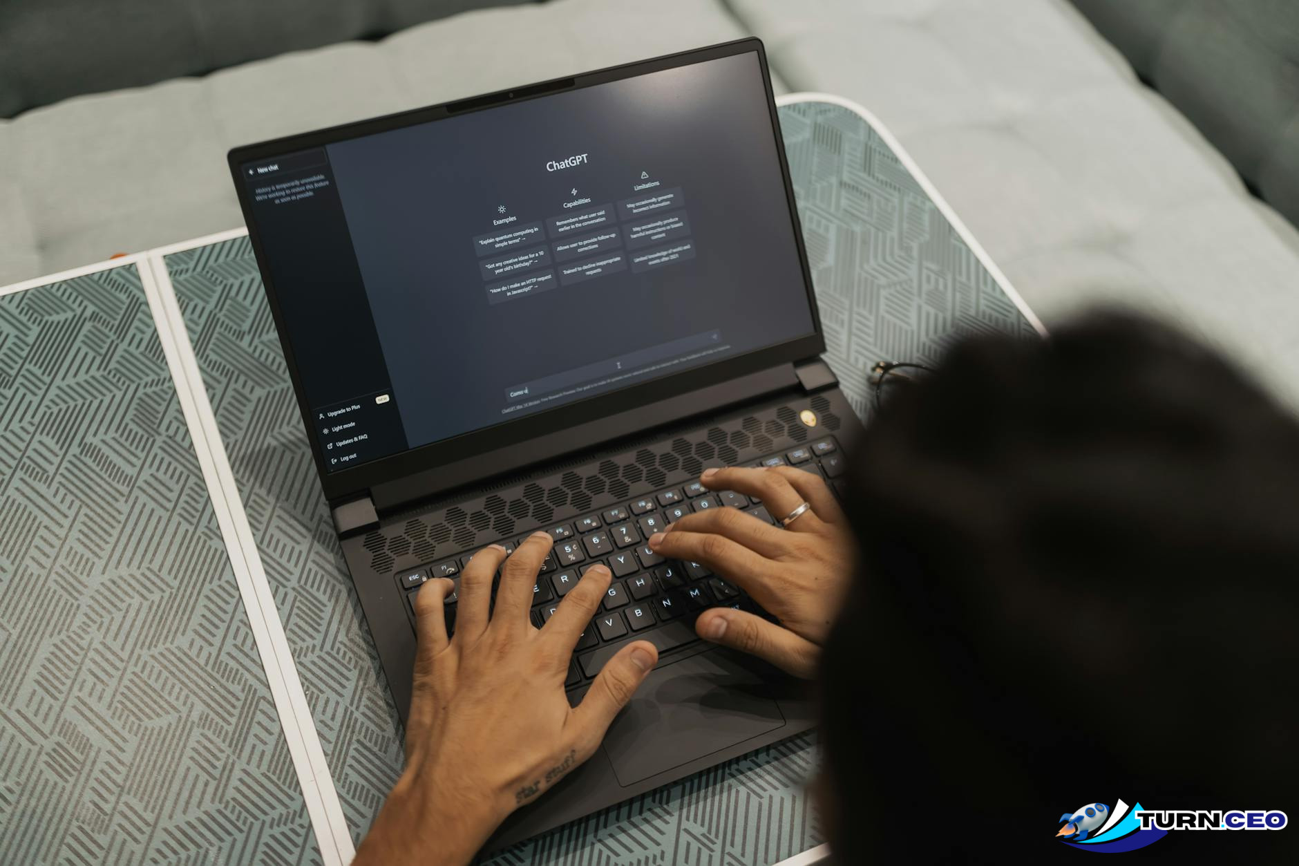 Professional businesswoman working on laptop with AI interface graphics overlay