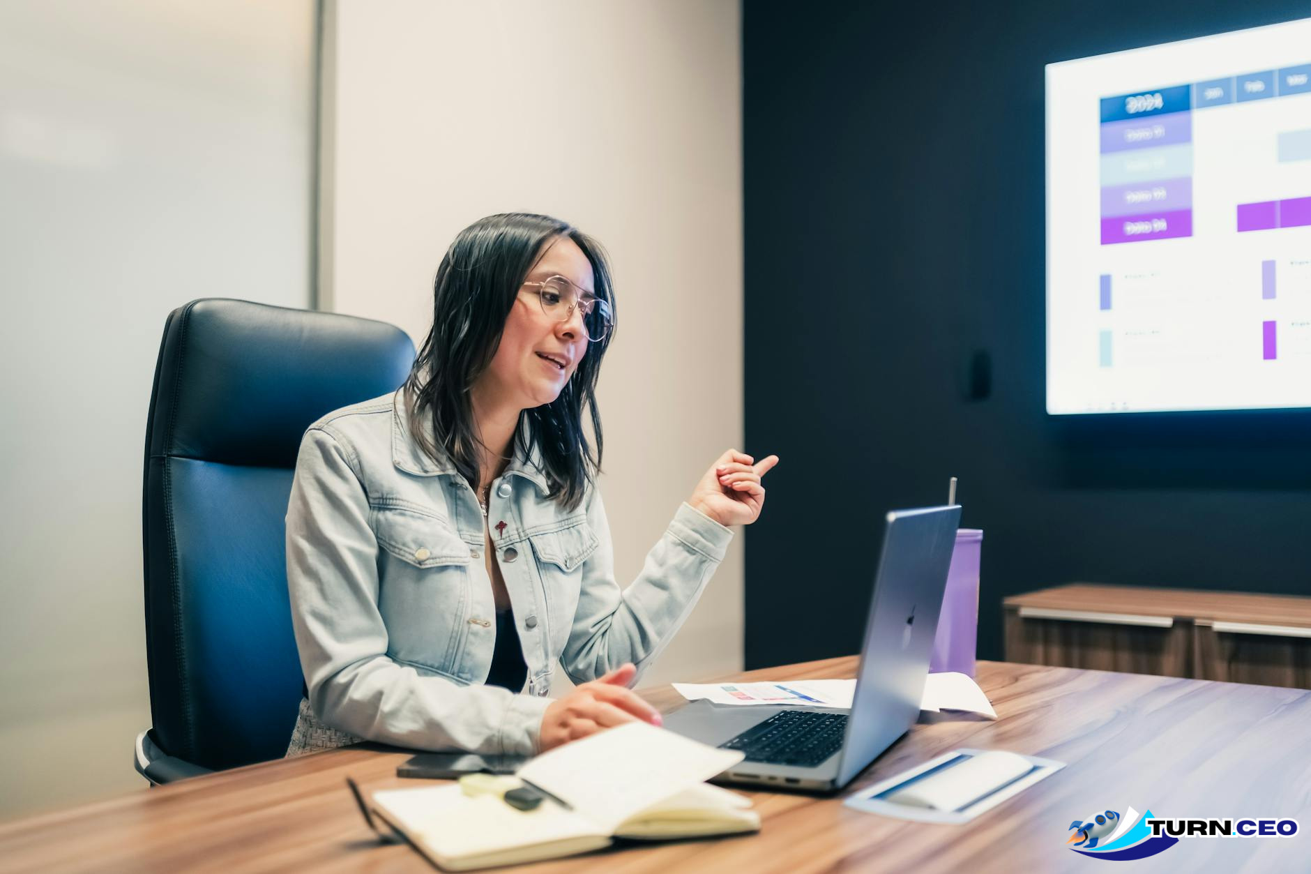 confident business professional presenting to clients in modern conference room