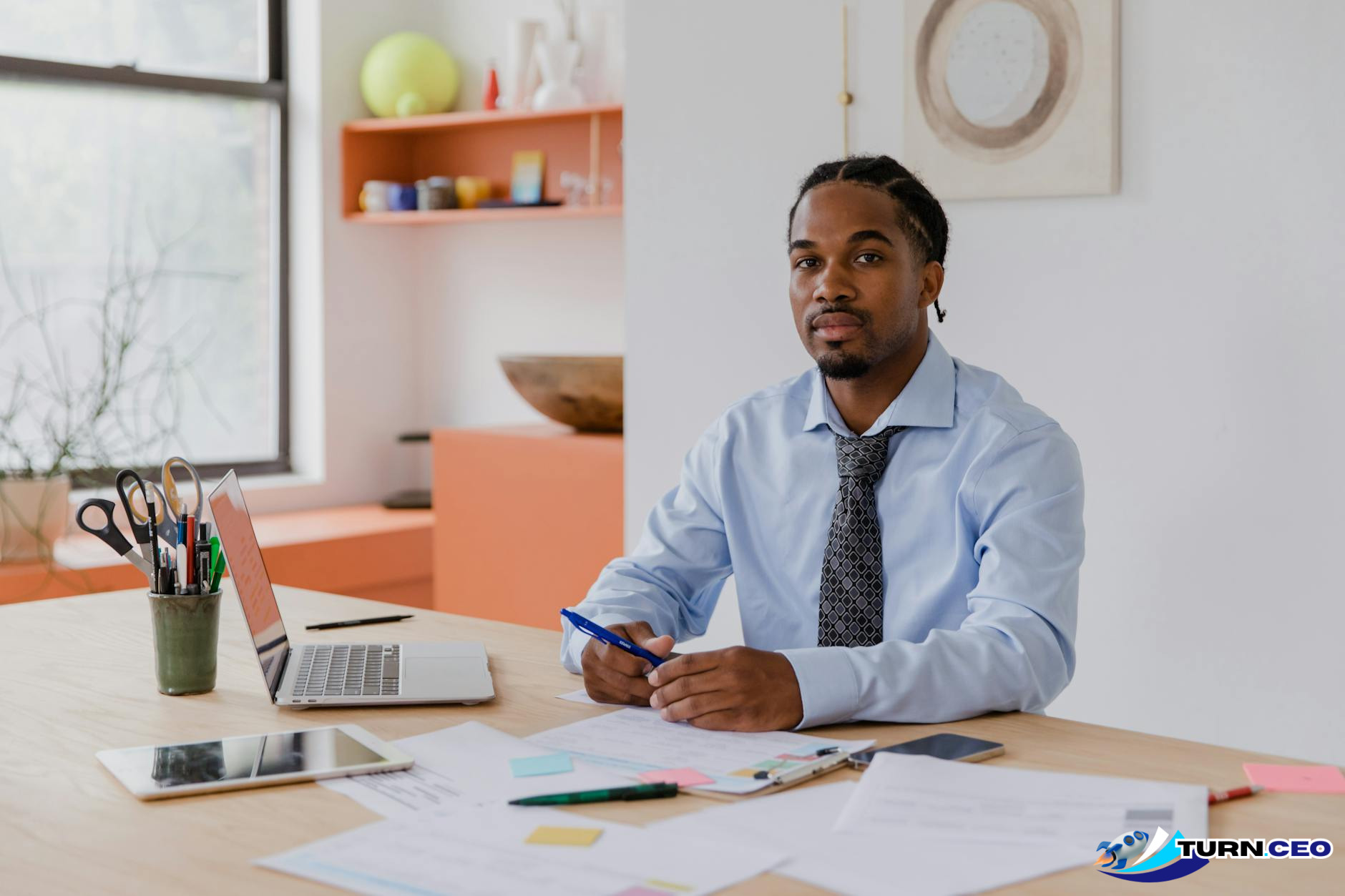 professional business owner working at desk with focused expression